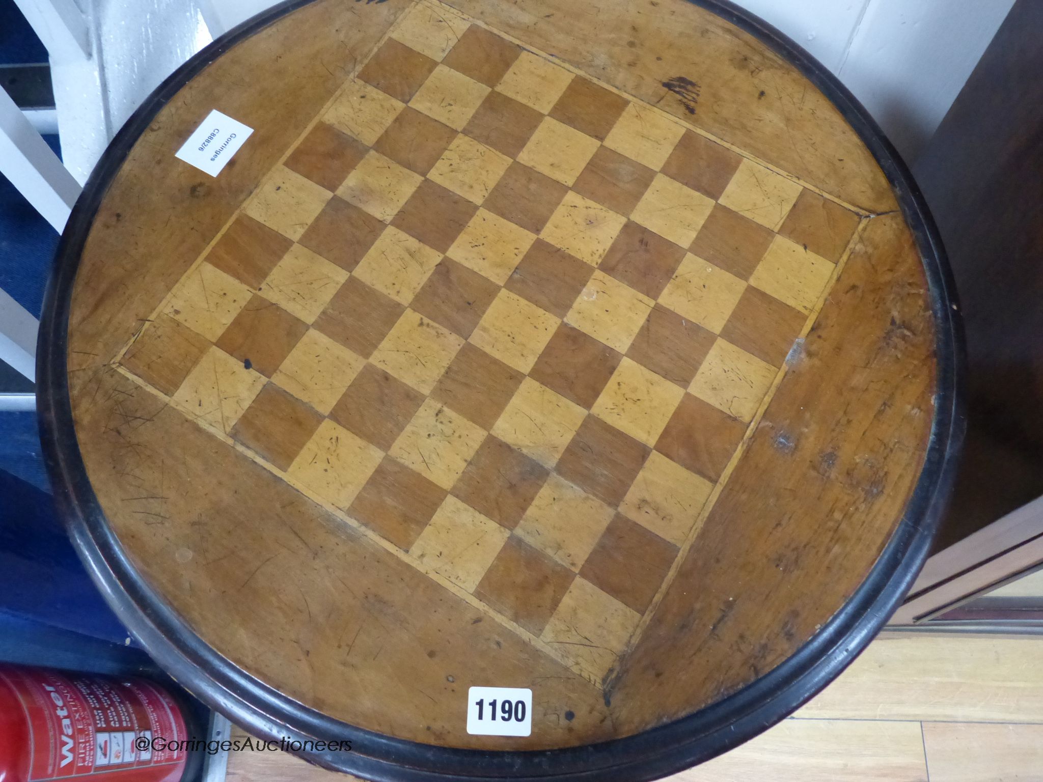 A Victorian mahogany tripod chess table. D-54, H-68cm.